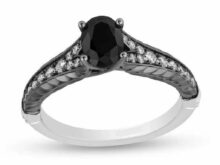 Enchanted Villains Maleficent 1.05 Ct Enhanced Black Oval Cut CZ & White Round Cut Diamond Ring in Sterling Silver Two-Tone SJ2172