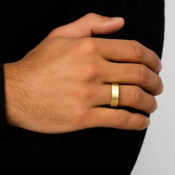 Modern square gold wedding ring for men worn on hand – black outfit