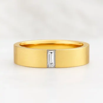 14K yellow gold men's wedding band with white baguette-cut gemstone set in center - front view