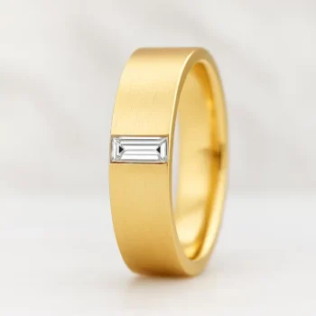 14K yellow gold men's wedding ring with white baguette gemstone - side profile view
