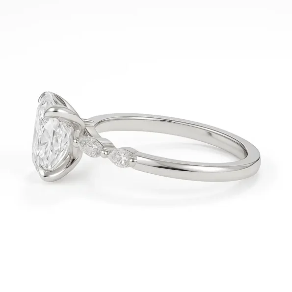 Side view of oval cut lab-grown diamond ring with sleek white gold band and marquise accents