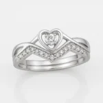 Heart-shaped diamond ring in white gold with V-shaped band and accent stones – front product view