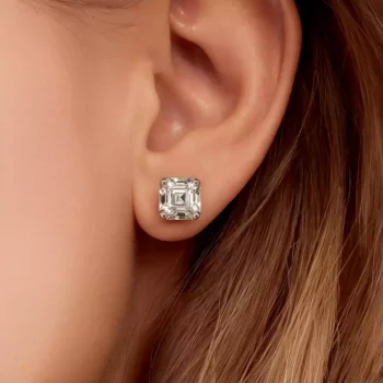 Asscher cut lab grown diamond stud earring in white gold worn by woman – classic square design with four-prong setting