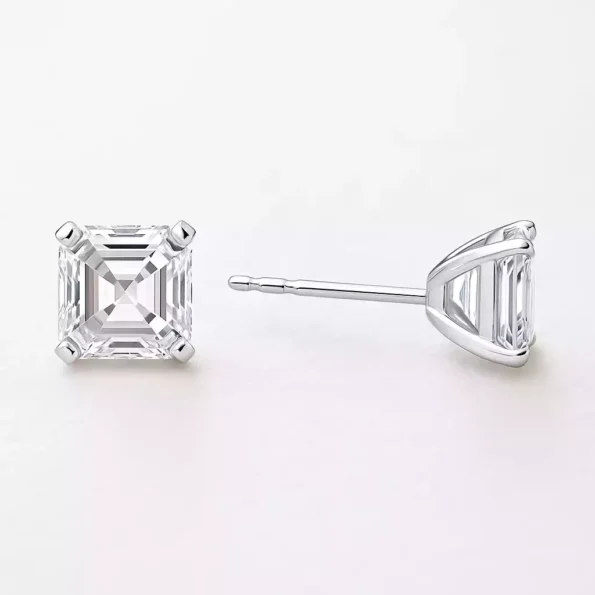 Asscher cut diamond stud earrings with secure four-prong basket setting and straight post in white gold – side and front angle