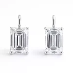 Front view of emerald cut lab-grown diamond drop earrings in white gold with four-prong setting