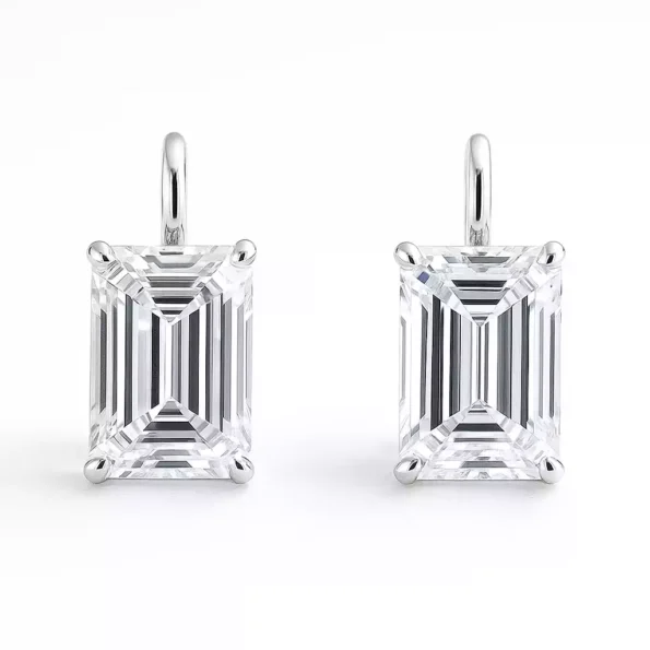 Front view of emerald cut lab-grown diamond drop earrings in white gold with four-prong setting