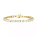 Elegant emerald and oval cut lab-grown diamond tennis bracelet in 18K yellow gold with box clasp