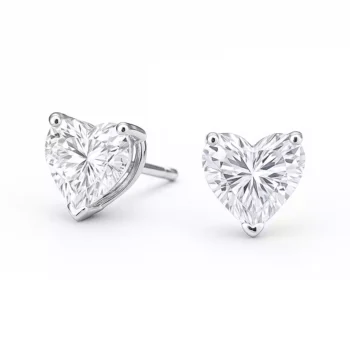 Close-up of heart-cut CVD lab-grown diamond earrings in white gold with three-prong setting