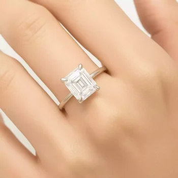 Asscher cut lab diamond engagement ring on woman's hand – classic white gold solitaire