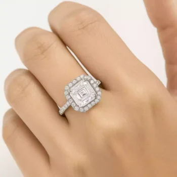 Asscher cut halo lab-grown diamond ring on woman's hand in white gold setting