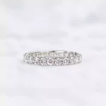 White gold lab-grown diamond eternity ring with round brilliant diamonds