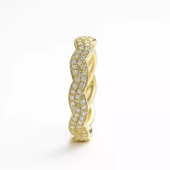 Side angle of yellow gold twisted diamond ring, featuring a double-row pave setting in a woven design