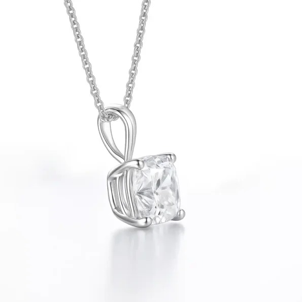 Side profile of cushion cut lab-grown diamond necklace with prong setting in 10K white gold