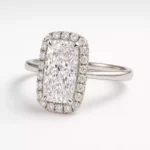 Elongated cushion cut lab-grown diamond halo engagement ring in white gold – front angle with pavé setting