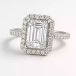 Emerald cut lab grown diamond engagement ring with halo setting in white gold