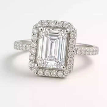 Emerald cut lab grown diamond engagement ring with halo setting in white gold
