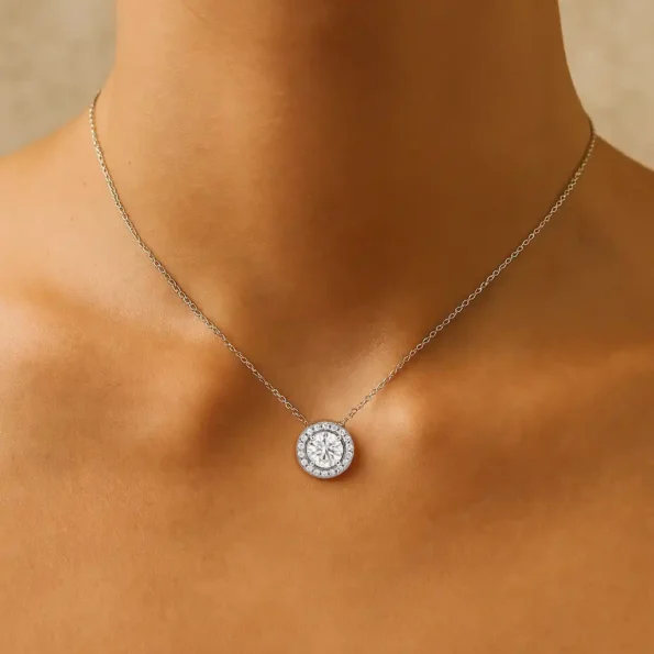 Round halo diamond necklace worn on model with black outfit – elegant neckline showcase for bridal or daily wear jewelry