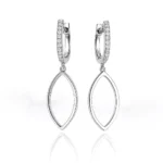 Silver marquise drop huggie earrings with prong diamond accents - front view on white background