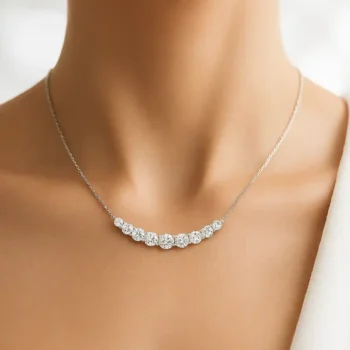 Model wearing journey diamond necklace with round lab-grown diamonds in prong setting on white gold chain