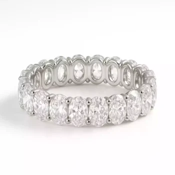 Side angled view of full eternity ring with oval cut lab diamonds set in prong style white gold