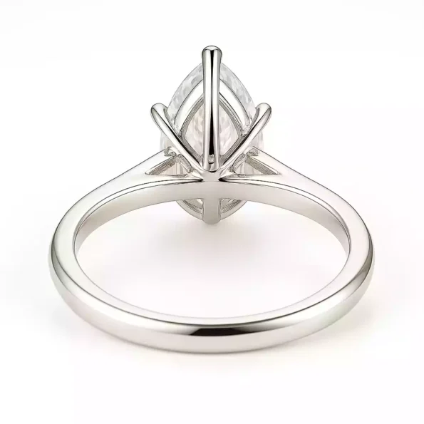 Back view of pear shaped lab-grown diamond ring in white gold with V-prong and open basket design