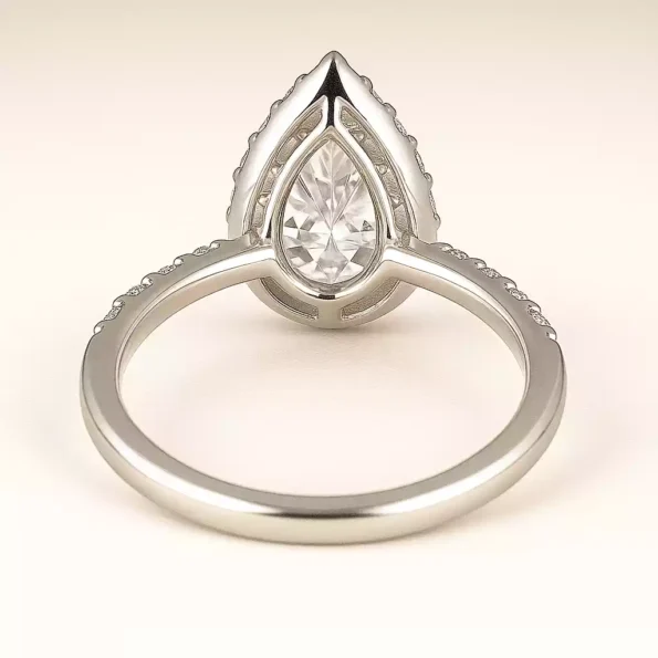 Backside design of pear cut halo diamond ring with white gold band