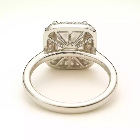 Basket view of princess halo diamond ring with intricate prong setting in white gold.