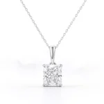 Radiant cut lab-grown diamond solitaire pendant necklace in white gold on white background.