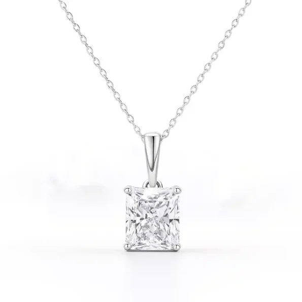 Radiant cut lab-grown diamond solitaire pendant necklace in white gold on white background.