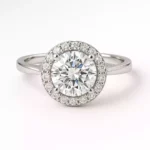 Round cut lab-grown diamond halo engagement ring in white gold – front view showcasing brilliant sparkle and modern elegance.