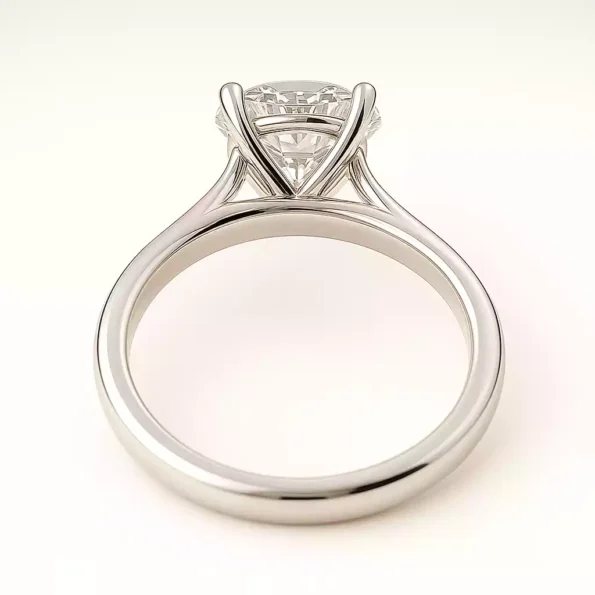 Back view of round cut lab-grown diamond ring in white gold with cathedral-style prong setting