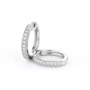 Close-up view of round huggie hoop earrings in white gold with prong-set lab-grown diamonds