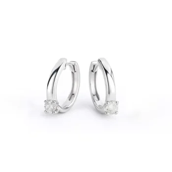 Close-up view of round solitaire diamond hoop earrings in white gold with prong setting