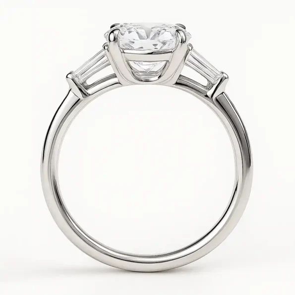 Elegant white gold diamond ring showcasing oval center stone and tapered baguette side profile – back view