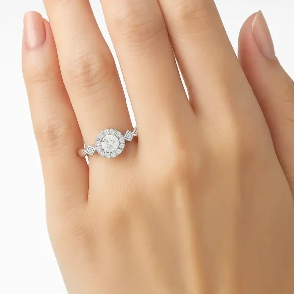 Vintage-inspired round cut diamond halo ring worn on finger with decorative side stones