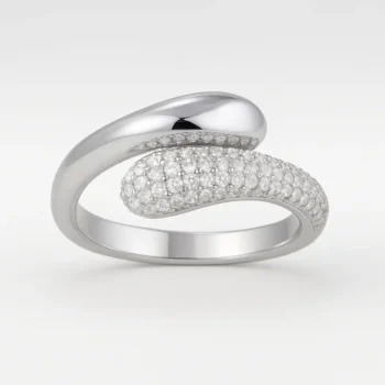 Bypass style white gold diamond ring with micro pavé setting and polished finish