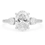 Oval cut lab-grown diamond engagement ring with pear side stones in white gold – front view