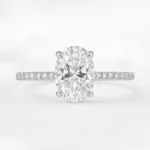 Oval cut lab grown diamond engagement ring with pavé band in white gold - front view