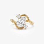 Pear Cut Diamond Swirl Engagement Ring, 1.50 CTW with Side Stones (E-F/VS1) IGI Certified